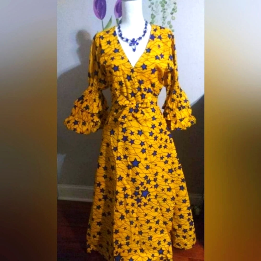 Beautiful Aftican maze gold  double bell sleeve v-neck umpire line dress.